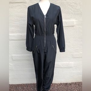 Bik Bok Black V-neck Jumpsuit with Silver Zippers. Size- XS